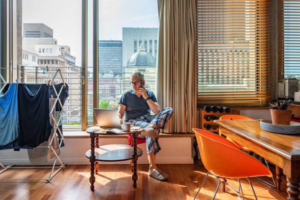istock A man working from home dressed in pajamas during Cape Town coronavirus lockdown 1219732040