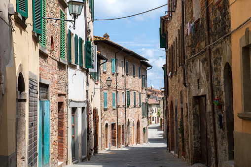Lucignano, Italy - May 13, 2018. Street view of Lucignano, a medieval town in the region of Tuscany, Italy.