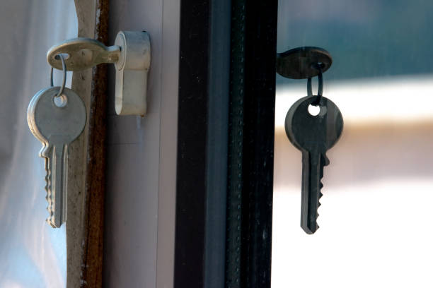 istock keys in a glass door lock 1219738257