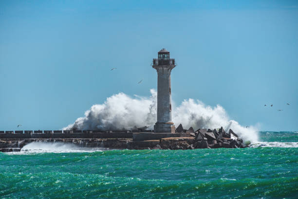 istock Sea waves crashing on Lighthouse 1219738728