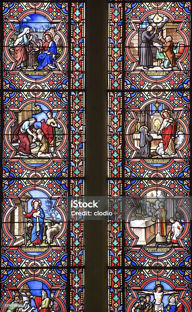Sainte-Suzanne (Loire, France) - Stained glass window Sainte-Suzanne (Mayenne, Pays de la Loire, France) - Stained glass in the ancient church (ancient artwork, public domain) Architectural Feature Stock Photo