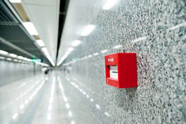 istock Red fire alarm on the wall of corridor 1219739624