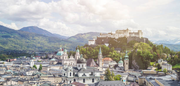 istock Salzburg summer time: Panoramic city landscape with Salzach and historic district 1219741201