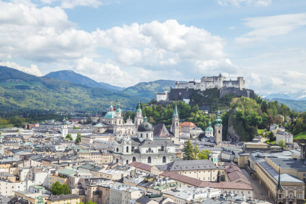 istock Salzburg summer time: Panoramic city landscape with Salzach and historic district 1219741221