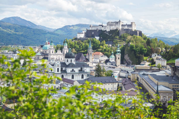 istock Salzburg summer time: Panoramic city landscape with Salzach and historic district 1219741230