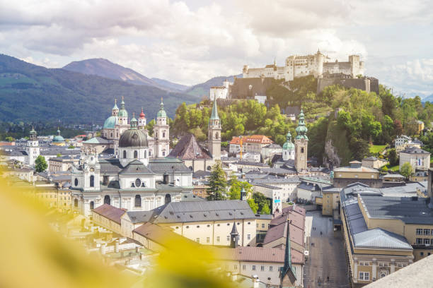 istock Salzburg summer time: Panoramic city landscape with Salzach and historic district 1219741991