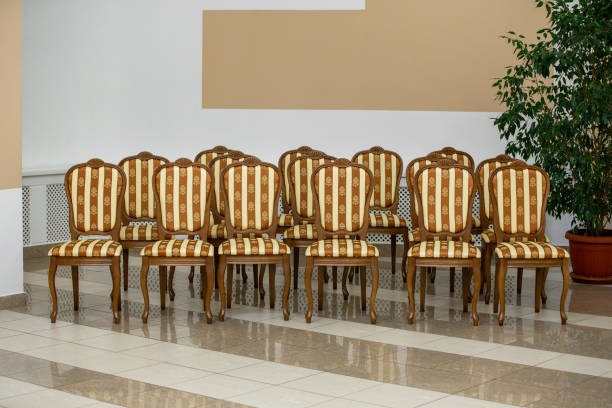 istock upholstered chairs stand in rows in the hall ready for a meeting 1219742440