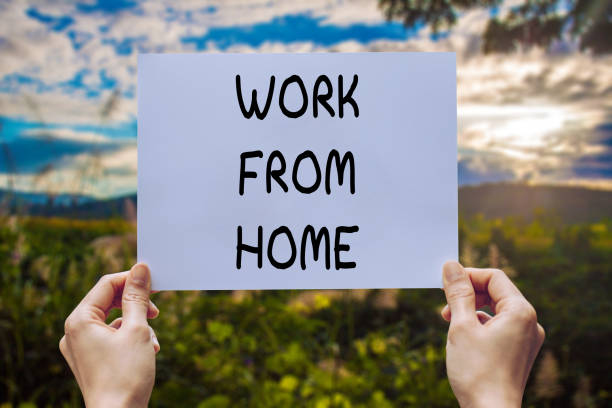 istock Hand show holding paper with word text work from home 1219742505