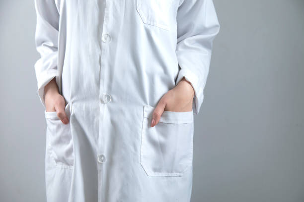 istock doctor woman hand in pocket 1219748088