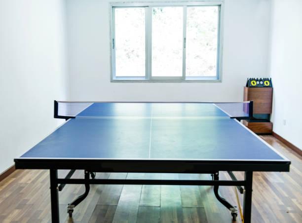 istock Table tennis table in games room 1219748123