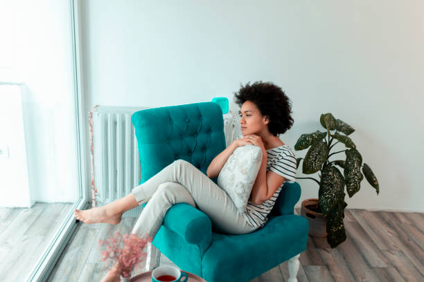 istock Woman enjoying leisure time at home 1219748208