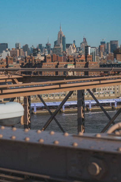 istock Empire State and Manhattan from the Brooklyn Bridge - November 2018 1219748303