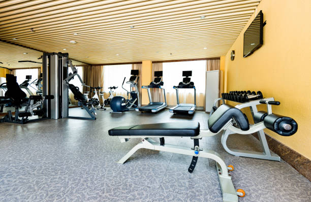 istock Group of exercise machines in gym room 1219748437