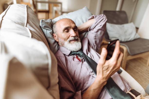 istock social distancing in a family - man doing a videocall 1219749749