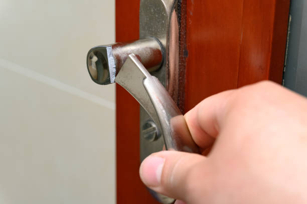 istock a broken metal lock on the door 1219751298