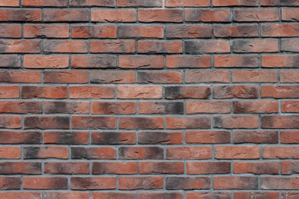 istock Red Exterior Polished Brick Wall 1219751318