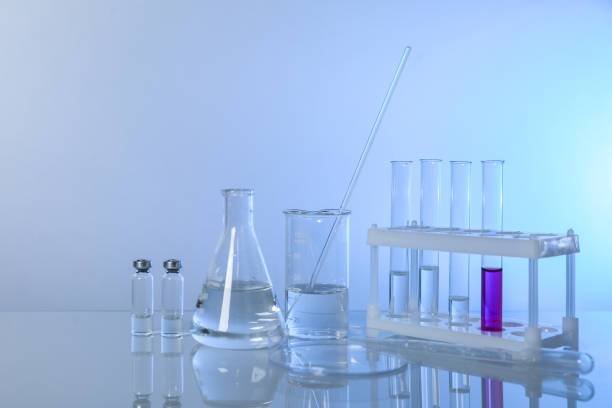 istock conceptual background with chemical flasks and lab glassware. 1219758215