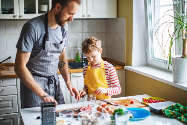 istock Kids cooking at home during quarantine 1219758223