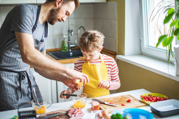 istock Kids cooking at home during quarantine 1219758311