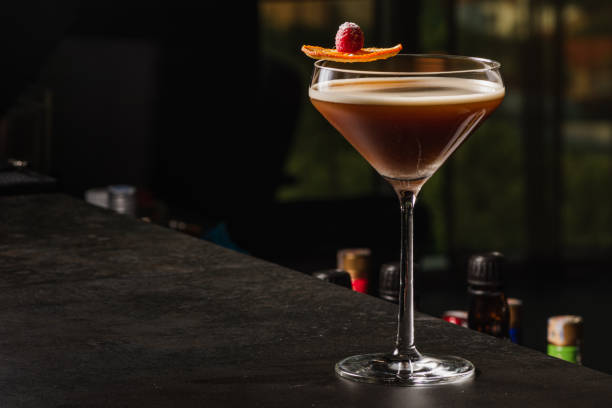 istock Espresso Martini Cocktail based on coffee, liqueur and vodka. Served with orange chips and raspberry. Space for text 1219758933