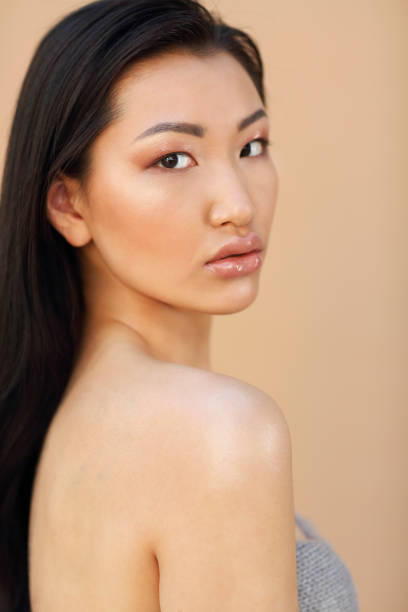 istock Beautiful asian model with long dark hair 1219761489