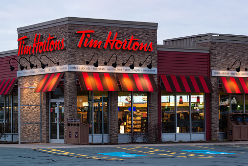 Bedford, Canada - April 11, 2020 - Tim Hortons restaurant in the Larry Uteck shopping area. The restaurant chain is only offering drive thru service at all locations during the ongoing COVID-19 pandemic.