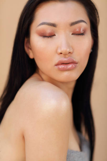 istock Beautiful asian model with long dark hair 1219763249