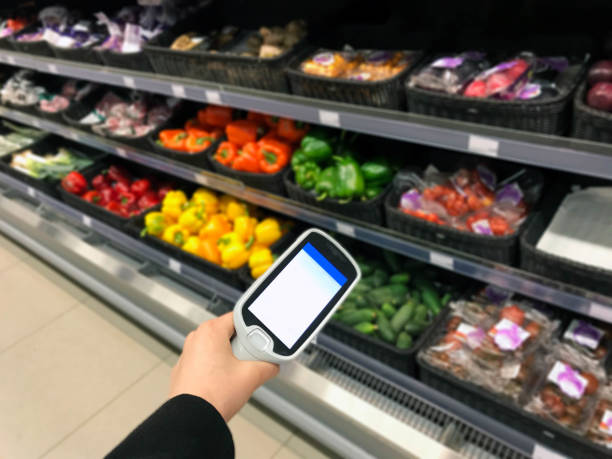 smart remote control grocery shoppingthe self check-out are on display at a supermarket smart remote control grocery shoppingthe self check-out are on display at a supermarket in Estonia self checkout photos stock pictures, royalty-free photos & images