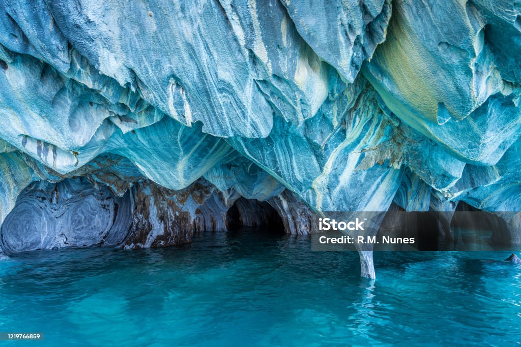 Natural Landmark Marble Caves on General Carrera Lake, Patagonia, Chile, South America The Marble Caves (Spanish: Cuevas de Marmol ) are a series of naturally sculpted caves in the General Carrera Lake on the border of Chile and Argentina, Patagonia, South America. Cathedral Stock Photo