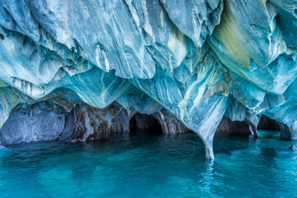 Natural Landmark Marble Caves on General Carrera Lake, Patagonia, Chile, South America The Marble Caves (Spanish: Cuevas de Marmol ) are a series of naturally sculpted caves in the General Carrera Lake on the border of Chile and Argentina, Patagonia, South America. marble caves patagonia chile stock pictures, royalty-free photos & images