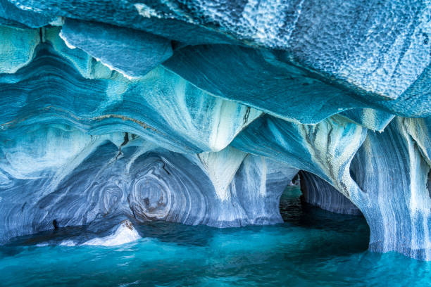 Natural Landmark Marble Caves on General Carrera Lake, Patagonia, Chile, South America The Marble Caves (Spanish: Cuevas de Marmol ) are a series of naturally sculpted caves in the General Carrera Lake on the border of Chile and Argentina, Patagonia, South America. marble caves patagonia chile stock pictures, royalty-free photos & images