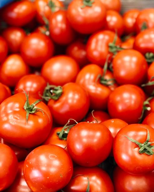 istock Red tomatoes for food textures 1219767260