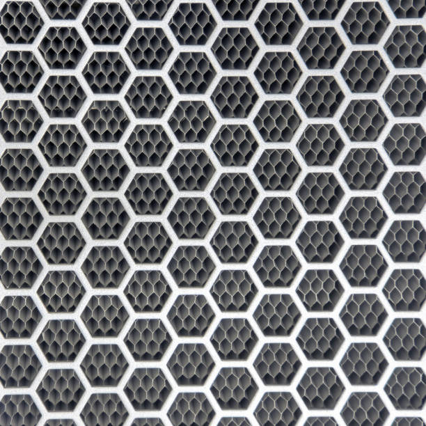 Background metal grilles with hexagonal holes