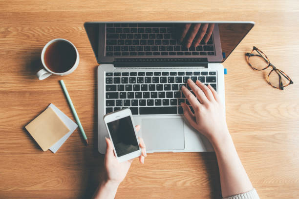 istock Young woman working in a home office. 1219768199