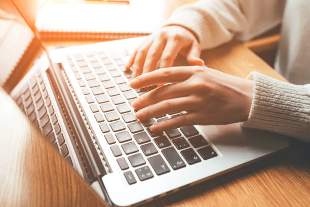 istock Young woman working in home on her laptop computer. 1219768201