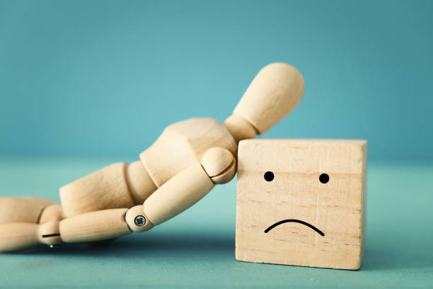 istock concept image of wooden dummy with worried stressed thoughts. depression, obsessive compulsive, adhd, anxiety disorders concept 1219768237
