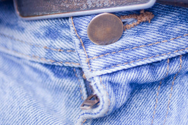 istock Button and zipper of blue jeans 1219770830