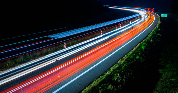 istock ights of cars with night 1219770842
