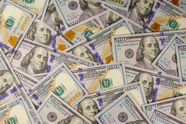 istock Background of american one hundred dollar bills 1219771263
