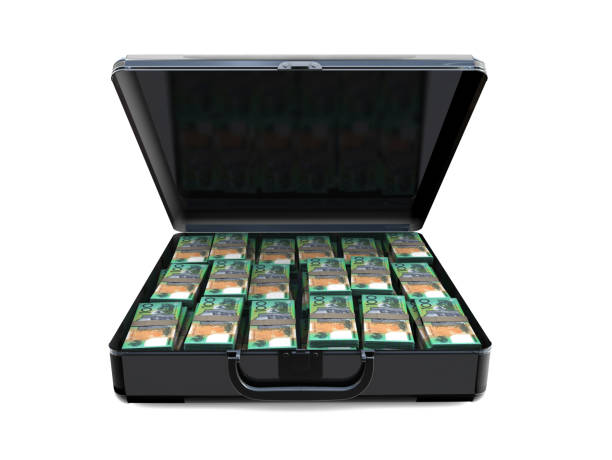 Suitcase full of money Suitcase full of money australian dollar stock pictures, royalty-free photos & images