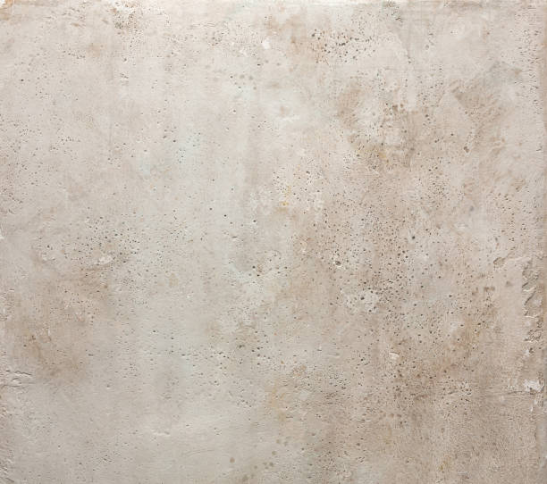 istock Grunge wall dirty beige concrete texture background 1219782225