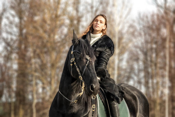 istock Girl and horse 1219782845