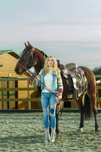 Girl and horse stock photo