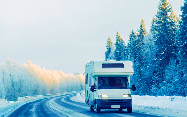istock Caravan in road in winter Rovaniemi 1219786215
