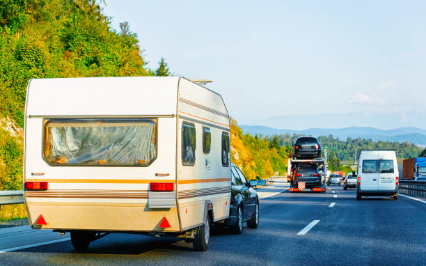 istock Camper rv on highway road Slovenia 1219786447