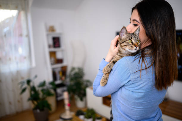 istock girl with a cat 1219789391