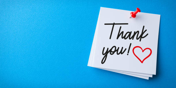 istock White Sticky Note With Thank You And Red Push Pin On Blue Background 1219790794