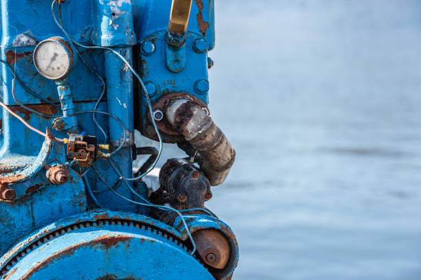 istock Old blue and rusty motor out in the sun. 1219797160