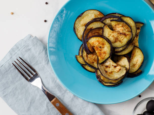 istock Fried eggplant in the blue plate. 1219797330