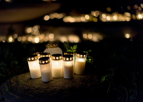 Cemetery candles and lanterns at all saint's eve.